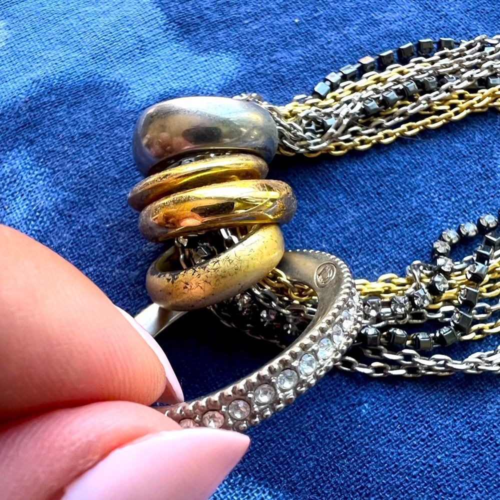 Giles & Brother Long multi-strand rhinestone necklace with ring pendants